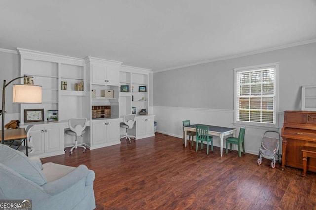 1504 Danora Dr, Waycross, GA 31501 - living area featuring wood finished floors, ornamental molding, and built in study area
