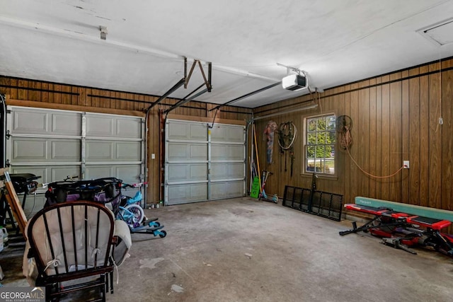 1504 Danora Dr, Waycross, GA 31501 - garage with a garage door opener and wooden walls