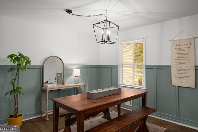 3142 Chamblee Gap Rd, Cumming, GA 30040 - dining area with dark wood-type flooring, a decorative wall, a chandelier, and a wainscoted wall
