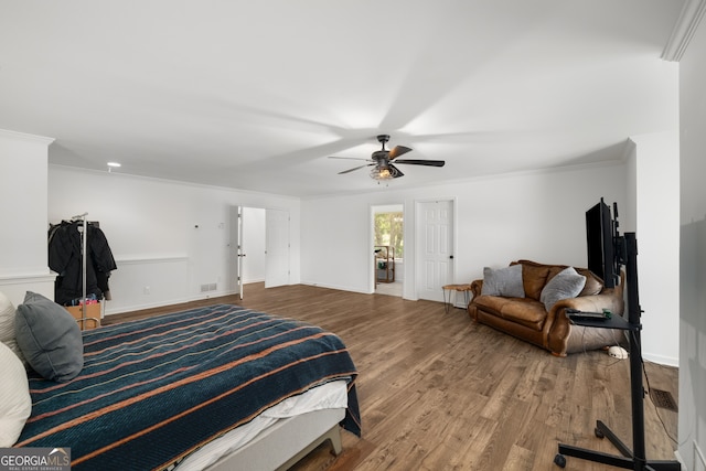 3142 Chamblee Gap Rd, Cumming, GA 30040 - bedroom featuring wood finished floors, crown molding, and ceiling fan