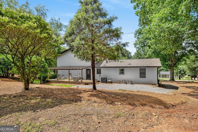 3142 Chamblee Gap Rd, Cumming, GA 30040 - rear view of house with a deck