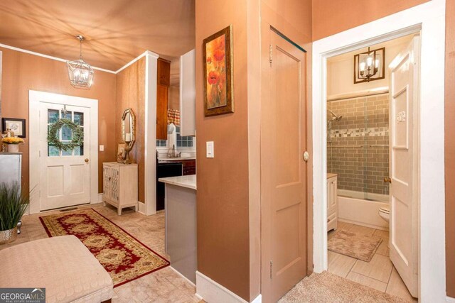 791 E Main St, Canton, GA 30114 - entryway featuring a chandelier and light tile patterned floors