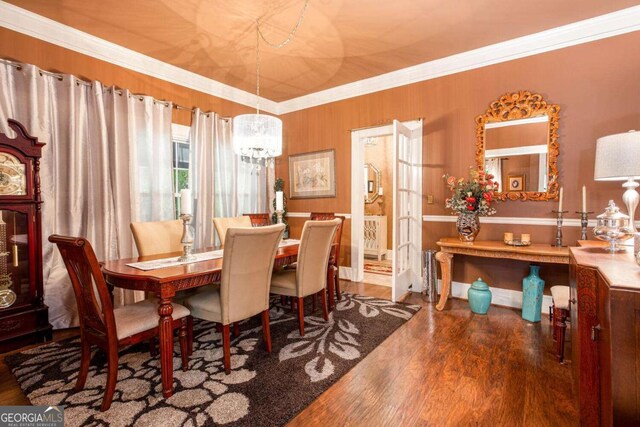 791 E Main St, Canton, GA 30114 - dining room featuring wood finished floors, a chandelier, and ornamental molding
