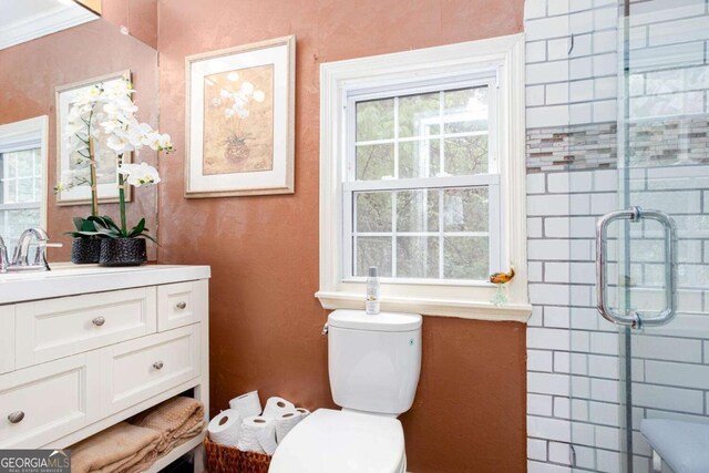 791 E Main St, Canton, GA 30114 - bathroom with vanity, a shower with shower door, and plenty of natural light