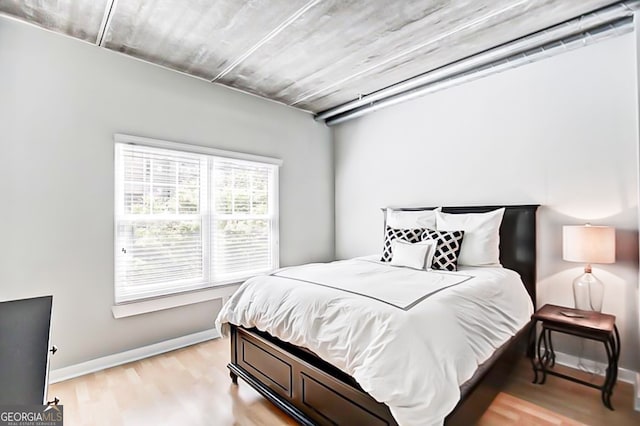 800 Peachtree St NE Unit 1319, Atlanta, GA 30308 - bedroom featuring light wood-style floors