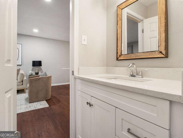 3149 Buford Hwy NE Unit 3, Brookhaven, GA 30329 - bathroom with vanity, wood finished floors, recessed lighting, and baseboards