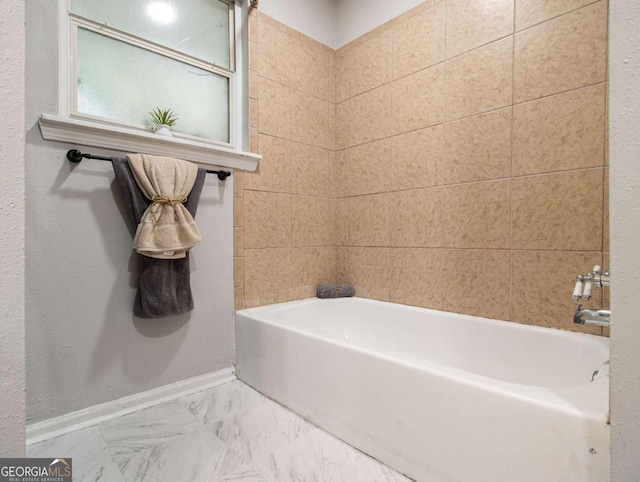 3149 Buford Hwy NE Unit 3, Brookhaven, GA 30329 - full bath with baseboards, washtub / shower combination, and marble look tiles