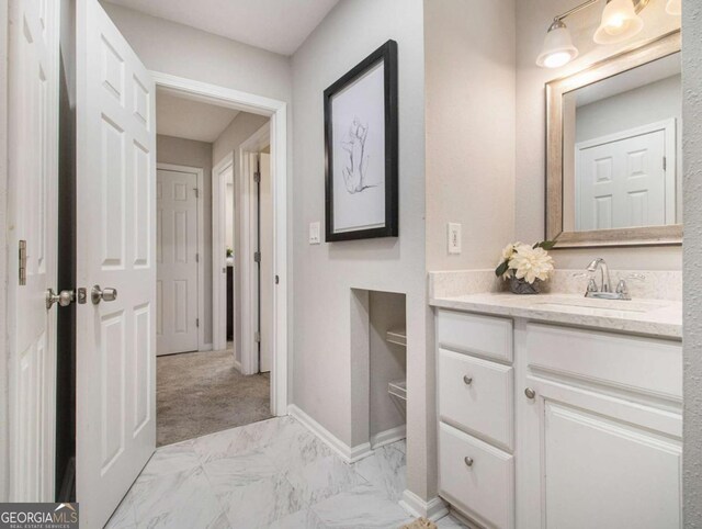 3149 Buford Hwy NE Unit 3, Brookhaven, GA 30329 - bathroom with vanity, marble finish flooring, and baseboards