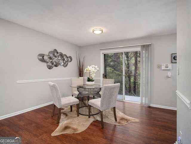 3149 Buford Hwy NE Unit 3, Brookhaven, GA 30329 - dining area featuring wood finished floors and baseboards