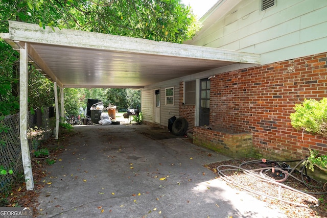 202 Pine St, Quitman, GA 31643 - view of patio / terrace with an attached carport