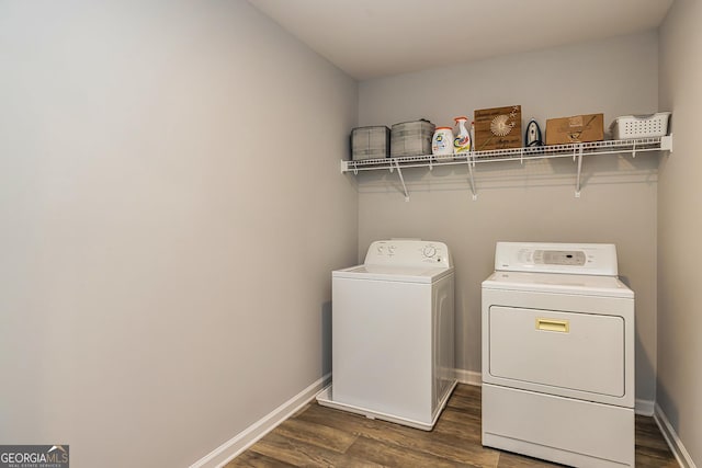979 Rowe Rd, Senoia, GA 30276 - laundry area with washer and dryer, dark wood finished floors, and baseboards