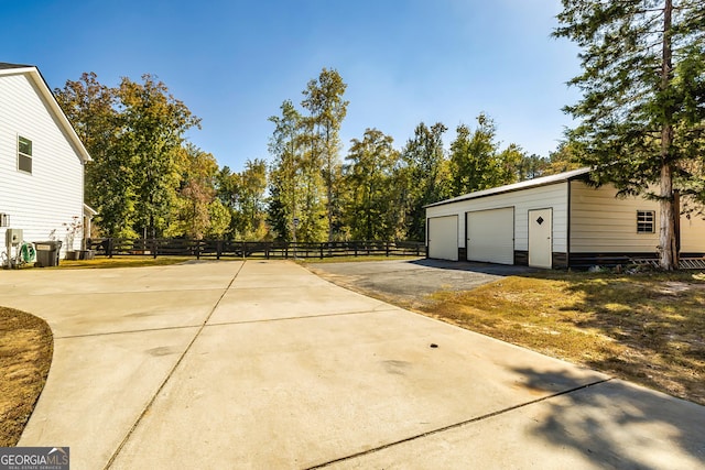 979 Rowe Rd, Senoia, GA 30276 - view of patio / terrace with a garage and an outdoor structure