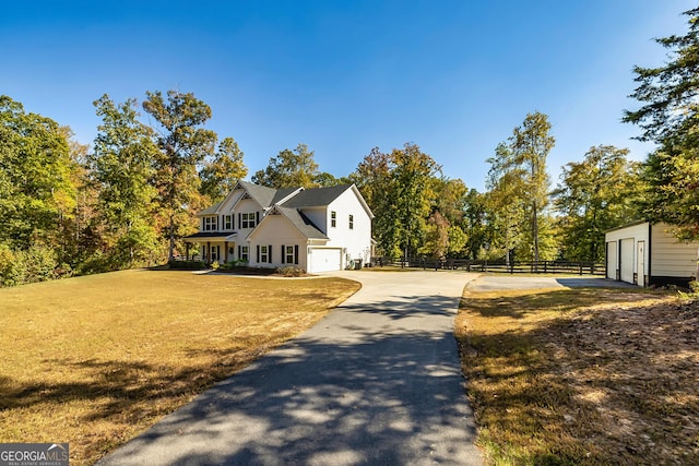 979 Rowe Rd, Senoia, GA 30276 - view of front of property featuring covered porch, an attached garage, and driveway
