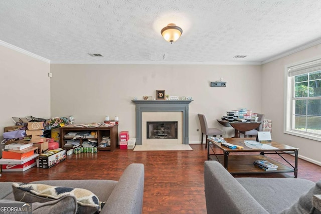 850 Long Branch Cir, Sugar Hill, GA 30518 - living area featuring a fireplace with flush hearth, wood finished floors, crown molding, a textured ceiling, and baseboards