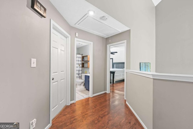 850 Long Branch Cir, Sugar Hill, GA 30518 - hallway featuring attic access, wood finished floors, and baseboards