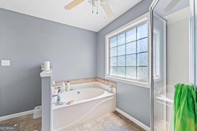 850 Long Branch Cir, Sugar Hill, GA 30518 - full bathroom featuring a bath, baseboards, ceiling fan, and tile patterned flooring