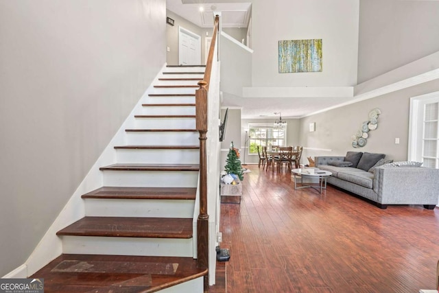 850 Long Branch Cir, Sugar Hill, GA 30518 - stairway with a high ceiling, wood finished floors, and baseboards
