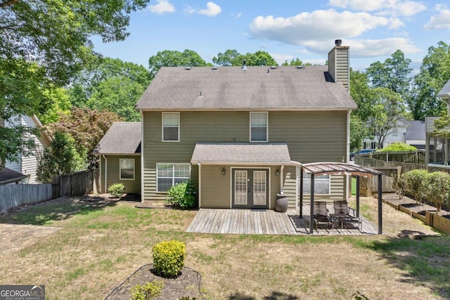 850 Long Branch Cir, Sugar Hill, GA 30518 - rear view of house featuring french doors, a chimney, a deck, and a vegetable garden