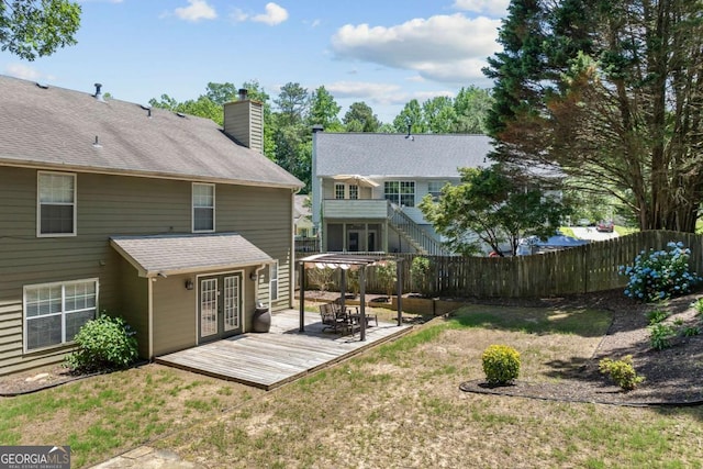 850 Long Branch Cir, Sugar Hill, GA 30518 - back of property featuring french doors, a wooden deck, and a chimney
