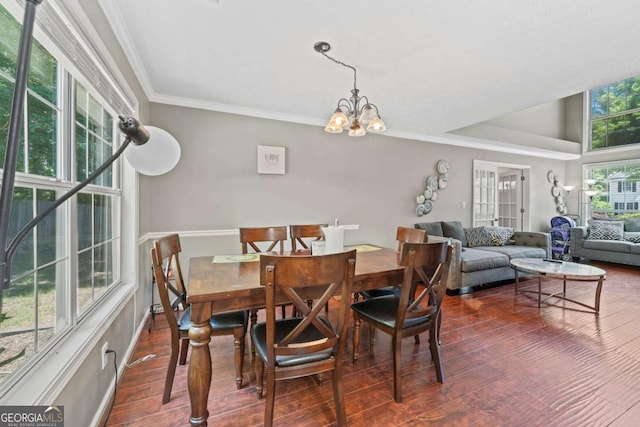 850 Long Branch Cir, Sugar Hill, GA 30518 - dining area featuring wood finished floors, a chandelier, crown molding, and baseboards