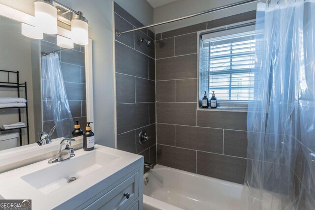 1764 Spring Ave, East Point, GA 30344 - bathroom with shower / tub combo with curtain and vanity