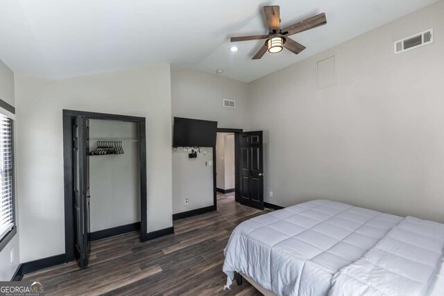1764 Spring Ave, East Point, GA 30344 - bedroom featuring dark wood finished floors, a closet, a ceiling fan, multiple windows, and high vaulted ceiling