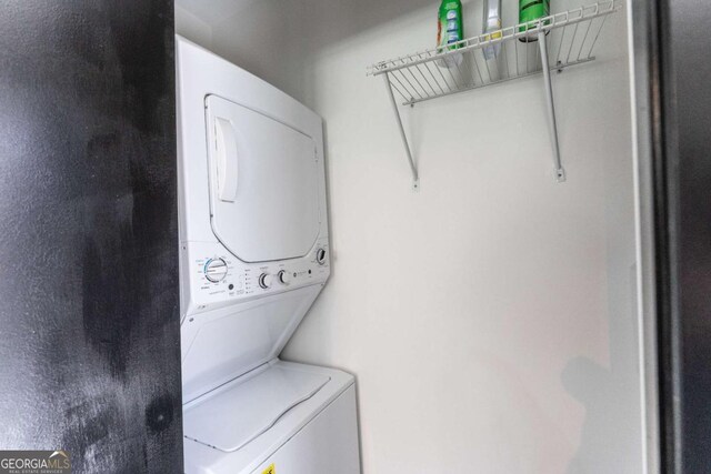 1764 Spring Ave, East Point, GA 30344 - laundry area featuring stacked washing machine and dryer