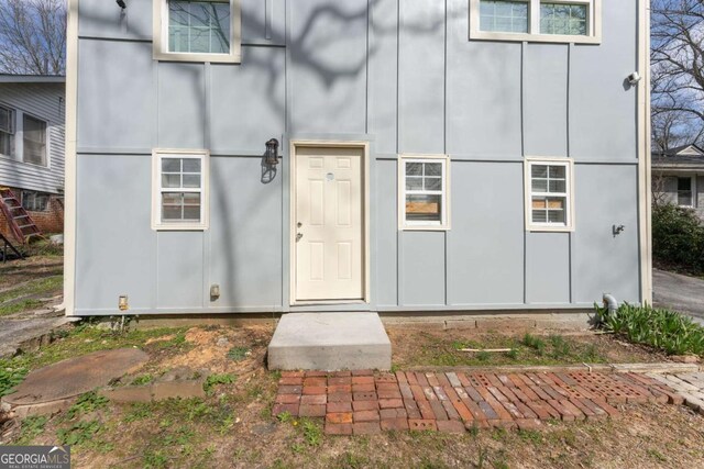 1764 Spring Ave, East Point, GA 30344 - property entrance featuring board and batten siding