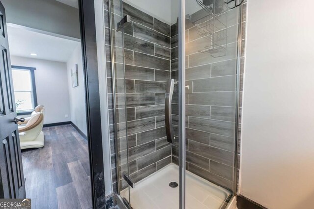 1764 Spring Ave, East Point, GA 30344 - full bathroom with a shower stall and wood finished floors
