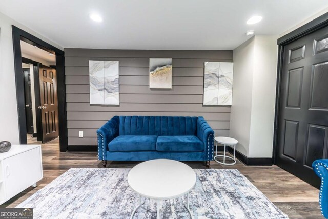 1764 Spring Ave, East Point, GA 30344 - living room featuring wood finished floors, recessed lighting, and wood walls