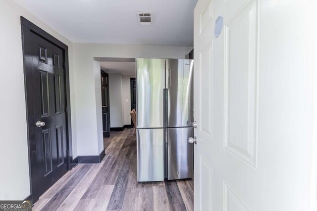 1764 Spring Ave, East Point, GA 30344 - kitchen with freestanding refrigerator and wood finished floors