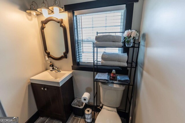 1764 Spring Ave, East Point, GA 30344 - bathroom featuring vanity and wood finished floors