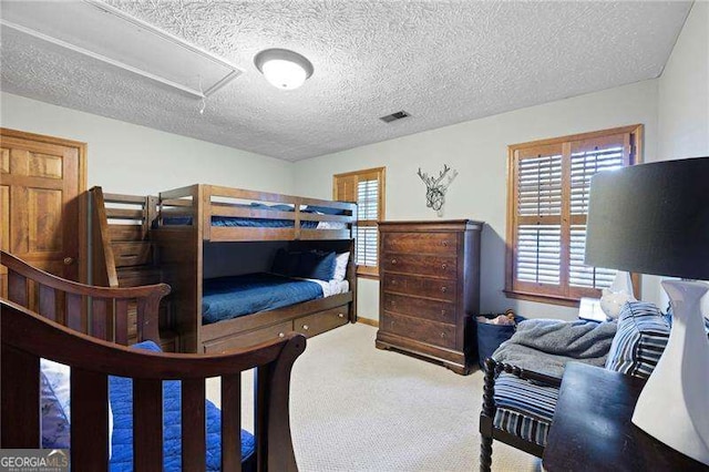 2041 Millspring Way NW, Kennesaw, GA 30152 - carpeted bedroom featuring attic access and a textured ceiling