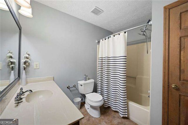 2041 Millspring Way NW, Kennesaw, GA 30152 - bathroom with vanity, toilet, a textured ceiling, and shower / bath combination with curtain
