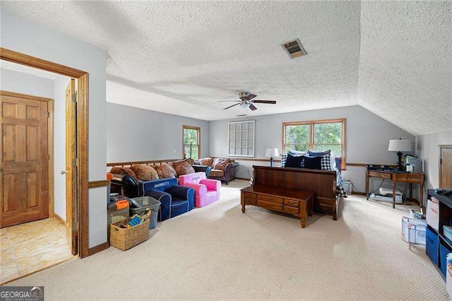 2041 Millspring Way NW, Kennesaw, GA 30152 - carpeted living area with ceiling fan, a textured ceiling, and baseboards