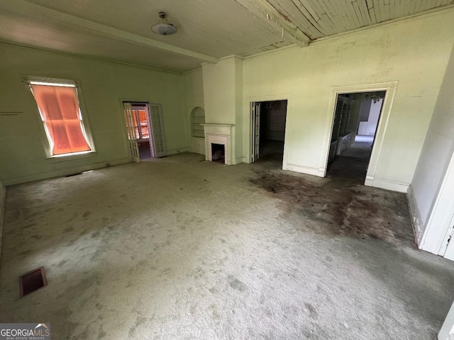 7782 Church St, Bartow, GA 30413 - unfurnished living room with carpet floors, a fireplace, and baseboards