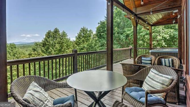 437 Spruce Cir Unit G, Mineral Bluff, GA 30559 - wooden deck with a hot tub