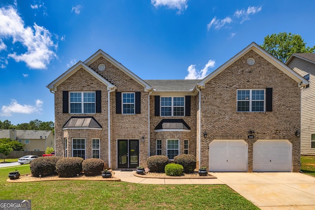 2689 Muskeg Ct SW, South Fulton, GA 30331 - view of front of home featuring brick siding, driveway, a front yard, and a garage