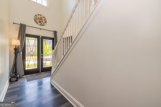 2689 Muskeg Ct SW, South Fulton, GA 30331 - foyer with french doors, dark wood-style flooring, baseboards, stairs, and a high ceiling
