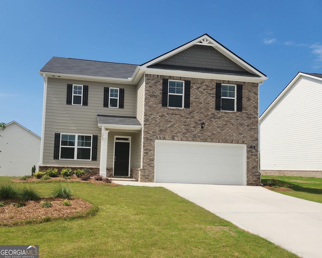 170 Aster Ave, Locust Grove, GA 30248 - craftsman inspired home with concrete driveway, a front yard, brick siding, and a garage