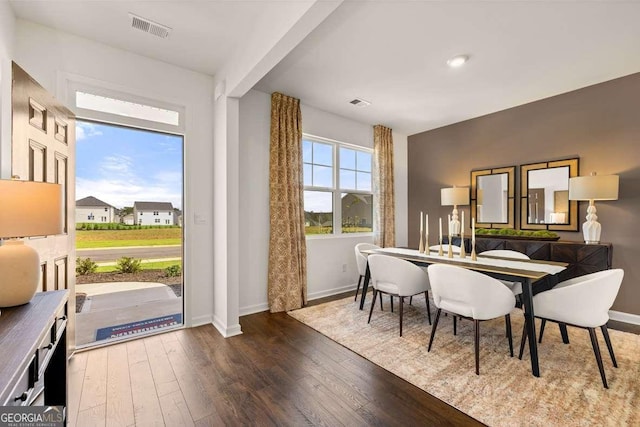 170 Aster Ave, Locust Grove, GA 30248 - dining area featuring baseboards and hardwood / wood-style flooring