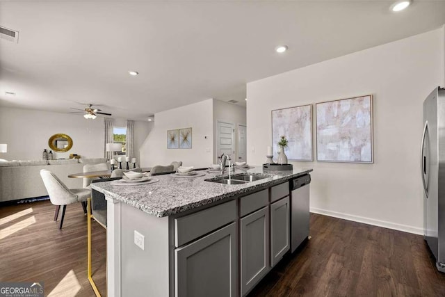 170 Aster Ave, Locust Grove, GA 30248 - kitchen with a sink, stainless steel appliances, gray cabinetry, open floor plan, and ceiling fan