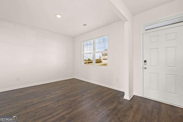 170 Aster Ave, Locust Grove, GA 30248 - foyer entrance featuring dark wood-type flooring, baseboards, and recessed lighting