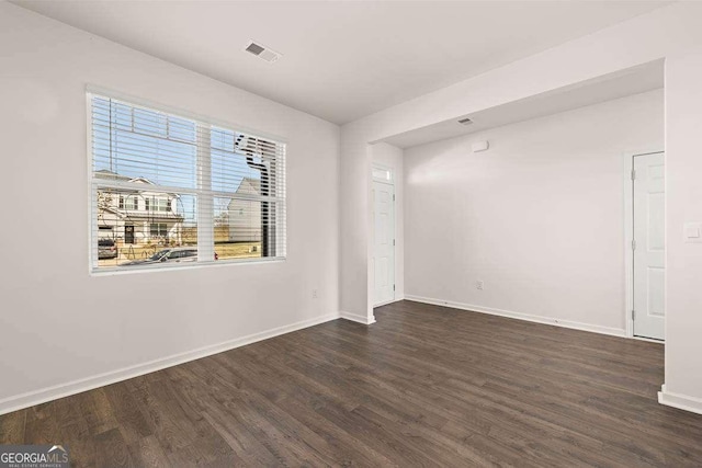 170 Aster Ave, Locust Grove, GA 30248 - unfurnished room with wood finished floors and baseboards