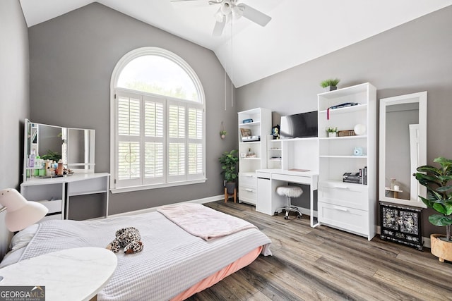 4527 Village Springs Run, Dunwoody, GA 30338 - bedroom with vaulted ceiling, wood finished floors, and a ceiling fan