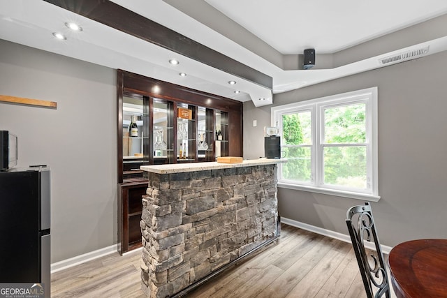 4527 Village Springs Run, Dunwoody, GA 30338 - indoor wet bar with freestanding refrigerator, baseboards, light wood-style flooring, and recessed lighting