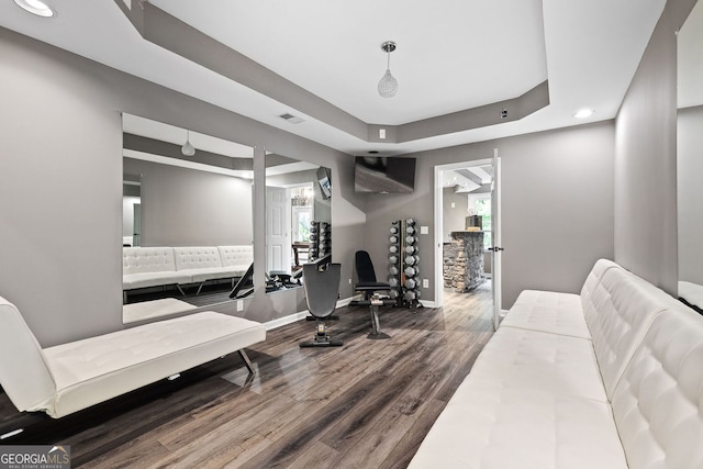 4527 Village Springs Run, Dunwoody, GA 30338 - workout area featuring recessed lighting, wood finished floors, healthy amount of natural light, a tray ceiling, and baseboards