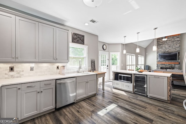 4527 Village Springs Run, Dunwoody, GA 30338 - kitchen featuring appliances with stainless steel finishes, gray cabinetry, a sink, wine cooler, and dark wood-style floors
