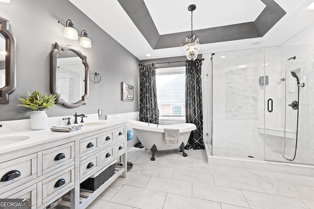 4527 Village Springs Run, Dunwoody, GA 30338 - bathroom featuring marble finish flooring, a freestanding tub, a chandelier, a stall shower, and double vanity