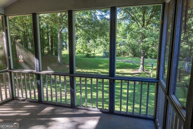 4370 Tradition Ter, Austell, GA 30106 - unfurnished sunroom featuring healthy amount of natural light and view of wooded area
